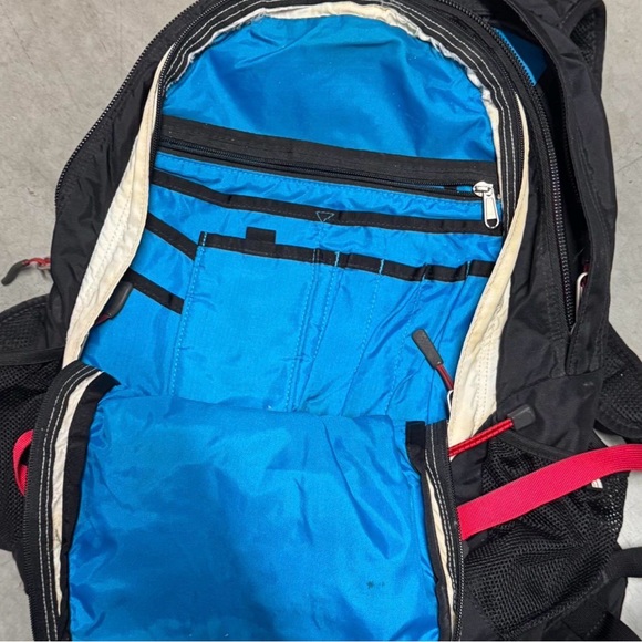 osprey 11l backpack Talon resistant materials Spinto Backpack Color:Rows of Bows / Pink Ice Brown Travel Laptop Backpack